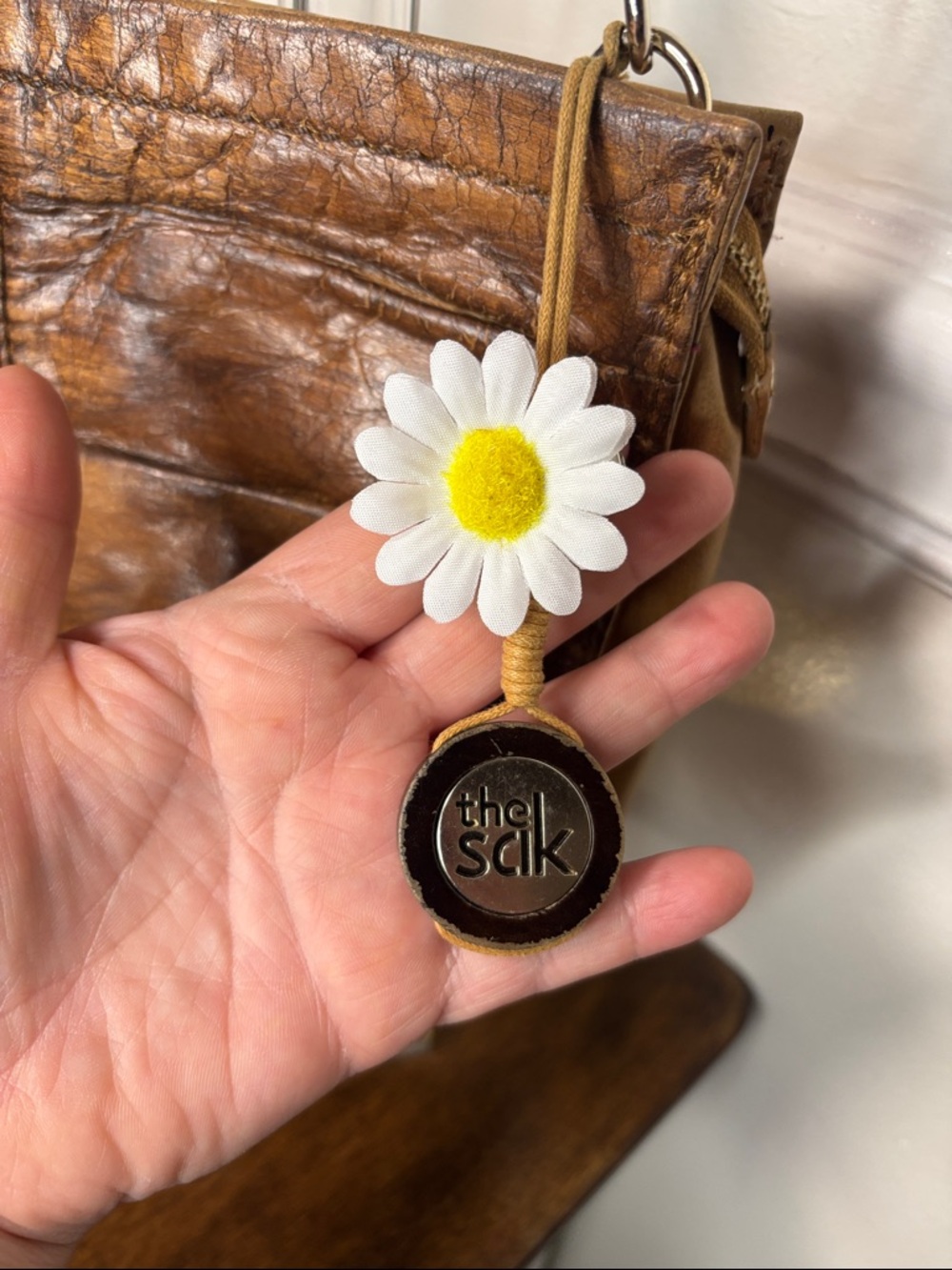 THE SAK distressed brown leather crossbody bag with daisy charm - Picture 8 of 15